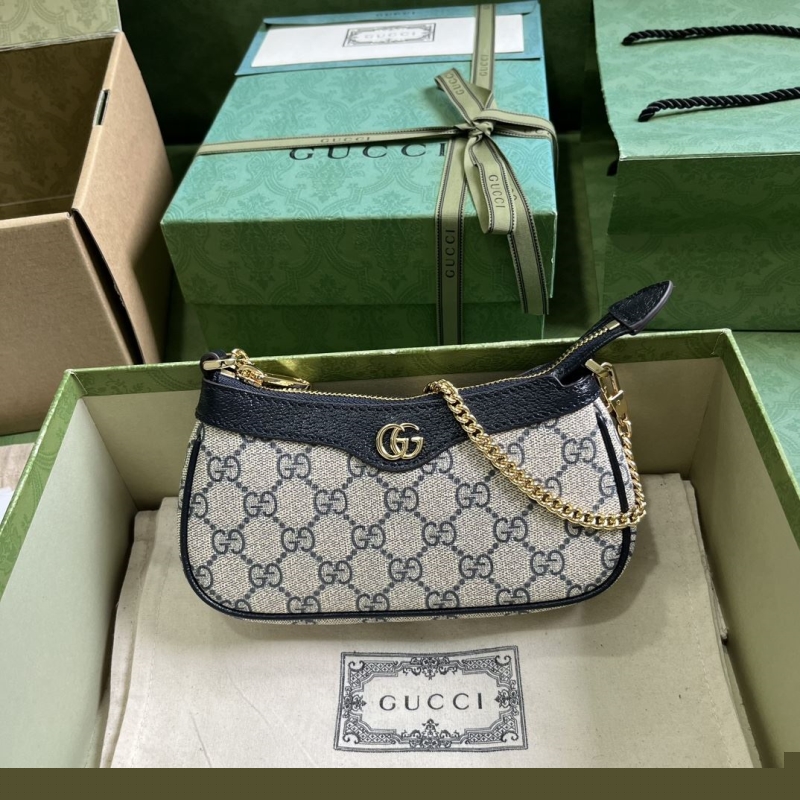 G*u*i top handle bags